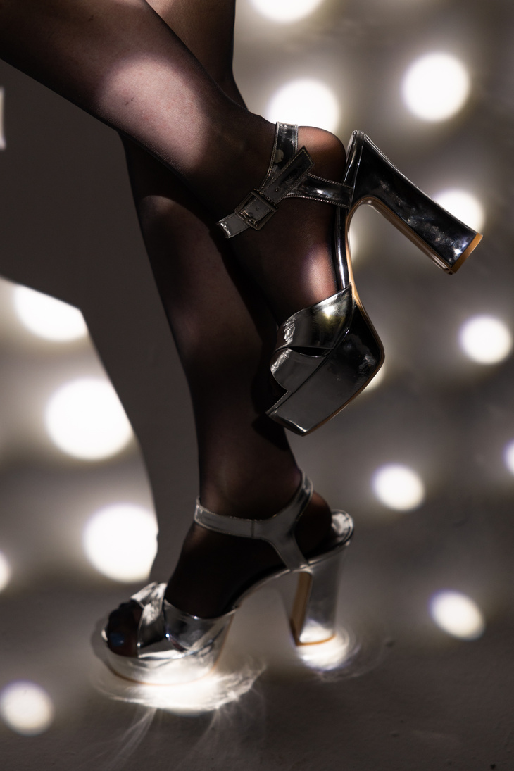 Woman Wearing Heels in Spotlight